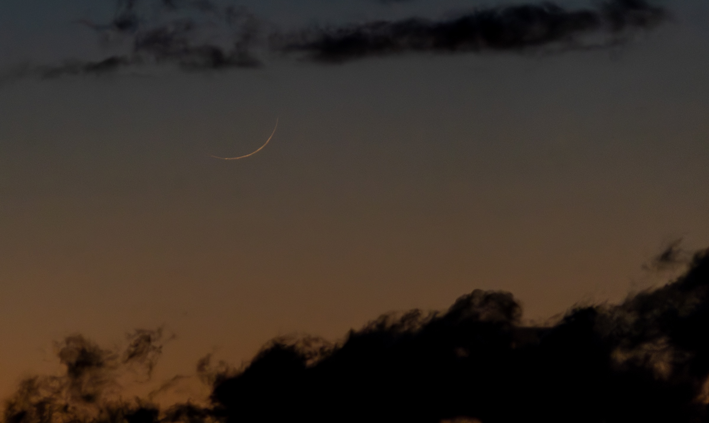 A telephoto of a 22-hour crescent moon